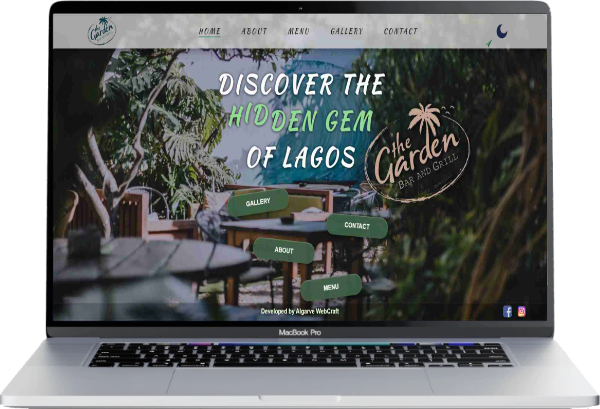 an open laptop displaying the Algarve Webcraft website.